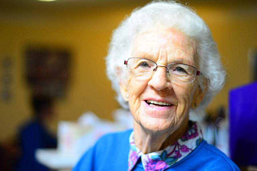Older lady smiling at camera